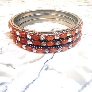 3 Gilt Group Bracelets